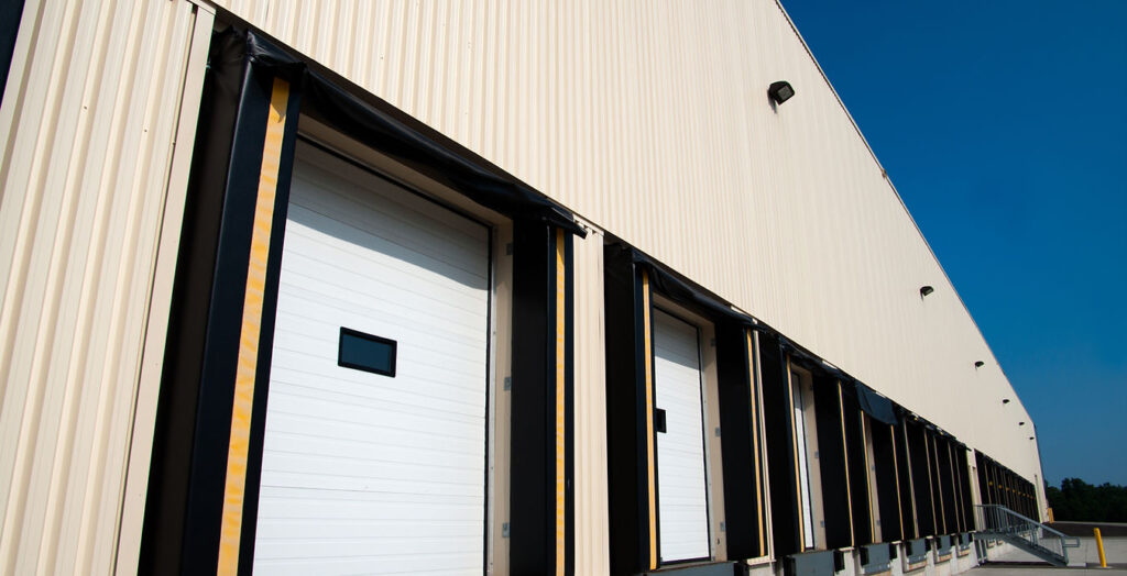 Sectional loading bay doors on an industrial warehouse